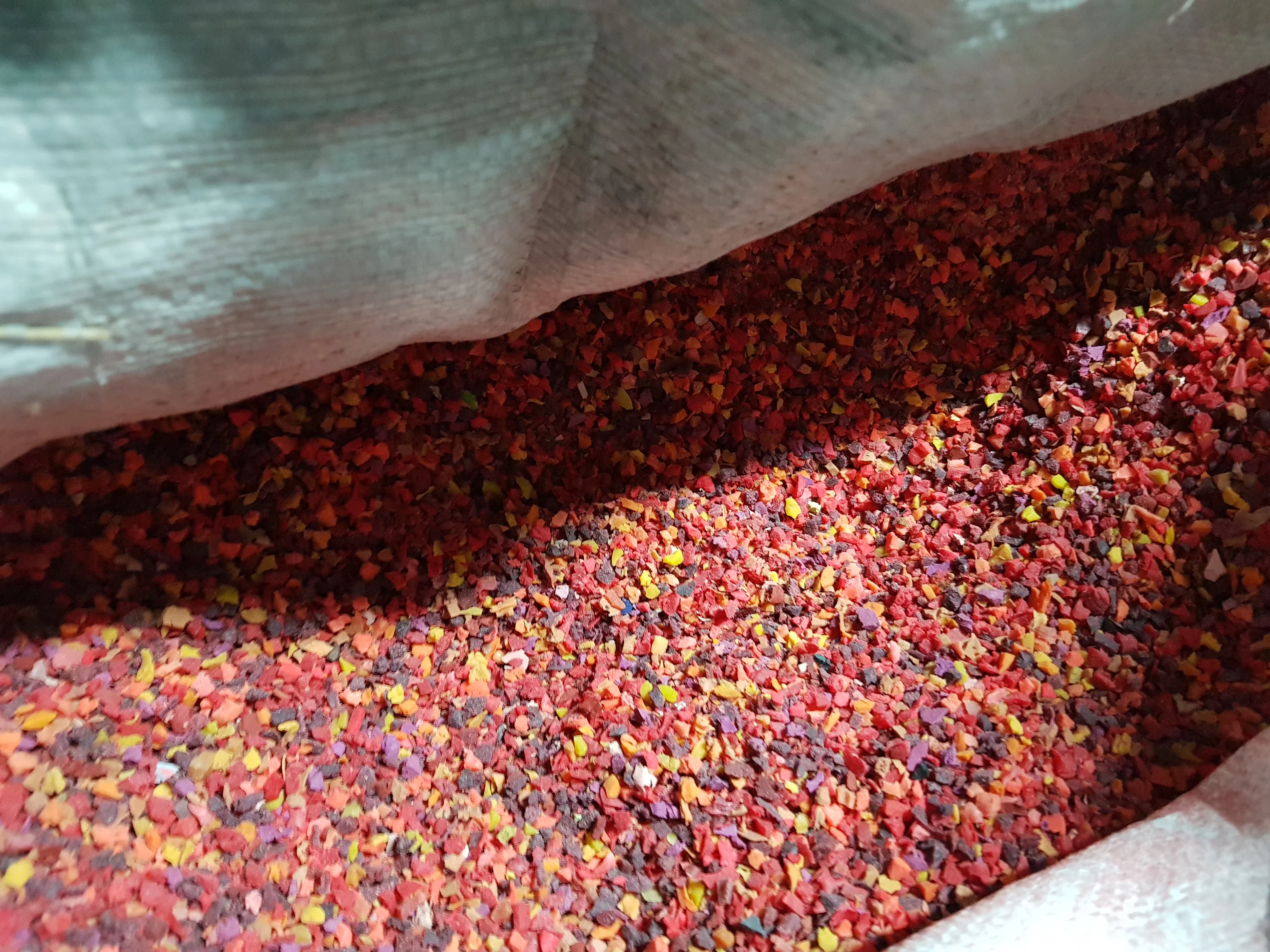 Recycled rubber granules prepared for New Movements footwear